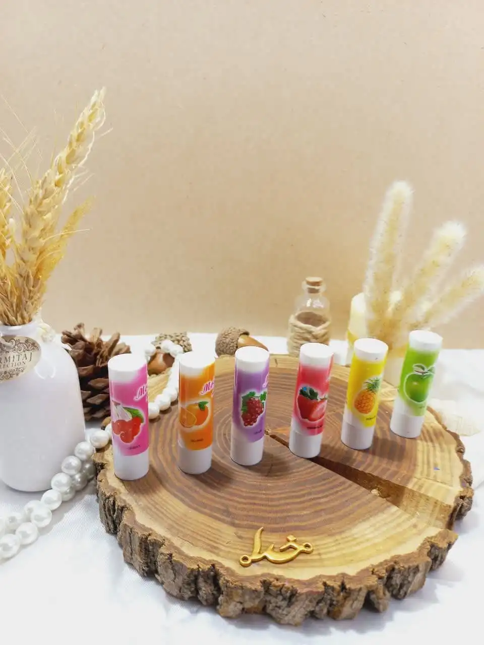 بالم لب ویتامینه  پوکه ای رایحه میوه ای برند MOISTURE